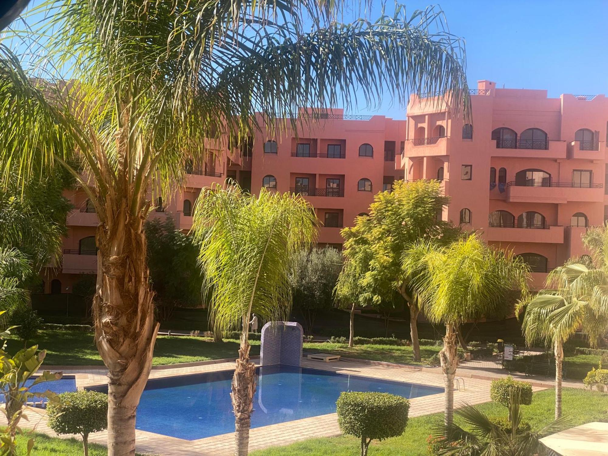 Un Moderne Chic Appartement Vue Sur Piscine Marraquexe Exterior foto